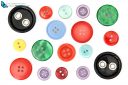 Set of different and colored sewing buttons, cut out and isolated on white background