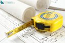 Construction plan with tape measure close-up