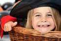 Portrait of little halloween girl looking at the camera