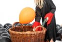 Halloween party girl with ballons on white background