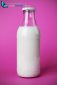 full milk bottle isolated on pink background