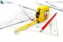 Architect work tools equipment on blueprint construction with measuring tape, pencil and wooden ruler.