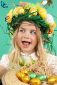 Cute little kid wearing fun hairstyle on the Easter day with basket of shiny eggs