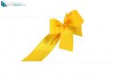yellow ribbon and bow cut out and isolated on white background