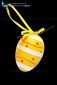 Easter egg decorated with ribbon, cut out and isolated on black background